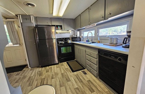 Adamstown House | Enjoy a Peaceful environment with neighboring mini pones a fire pit to sit under the stares. roll into the oversized parking lot and enjoy this lovely modern farm home.