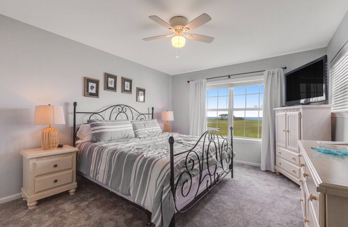 Ocean View House | Fantastic Bethany Bay gem with shared pool, screened porch, bay views & WiFi