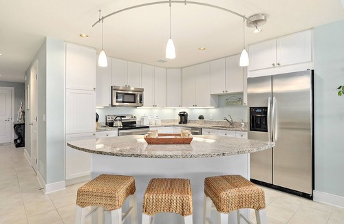 Midtown Ocean City Condo | Gateway Grand 902 Deluxe oceanfront building includes umbrellas, chairs, boogie boards, toys, and a beach cart!