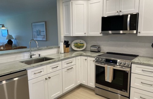 Central Beach Condo | Gorgeous Ocean Views, Walk to Town, COMPLETE RENOVATION in 2023!