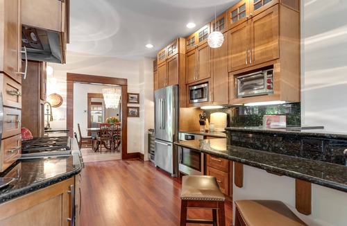 North End House | Iconic NorthEnd Treasure w/Porch Swing & Electric Fireplace | Private Office | Walk to Hyde Park!