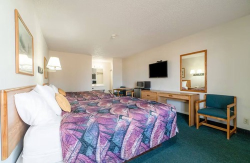 Texhoma Hotel | Inviting Two-Queen Room Conveniently Close to Dining Spots