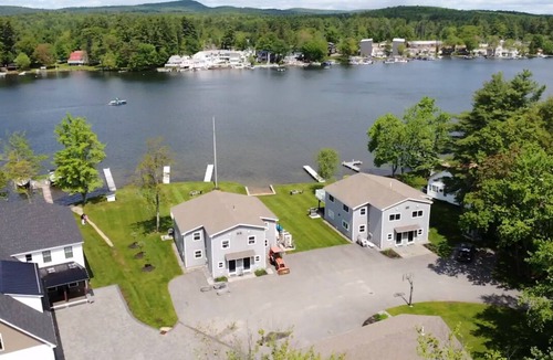 Lochmere House | Lakefront 3-bedroom Duplex on Lake Winnisquam, docks, Beach, WiFi, AC. B2B