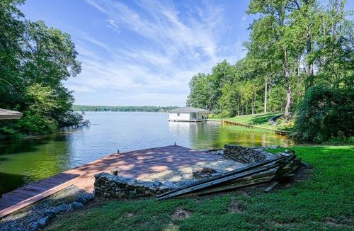 Livingston House | Lakefront home with deck, hot tub, game room, kayaks, & fireplace