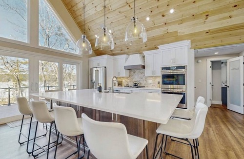 Gray House | Lakefront house with private beach, firepit, dock, 4 kayaks, grill & hot tub
