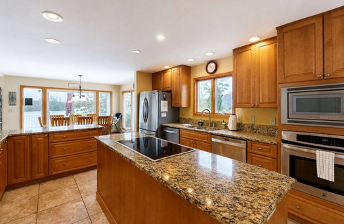 Livingston House | Lakefront retreat with views, hot tub, kid's play area, dock & fiber internet