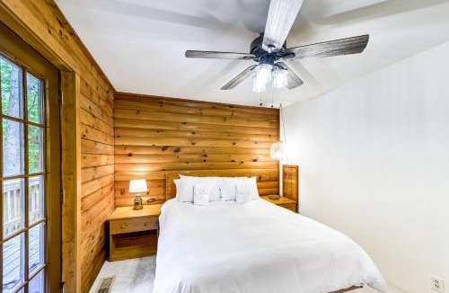 Blue Water House | Lakeside log home with a private deck, WiFi, firepit, central AC, & washer/dryer