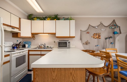 Midtown Ocean City Condo | Located close to the ocean, shops, dining and water activities. Ocean view from balcony.