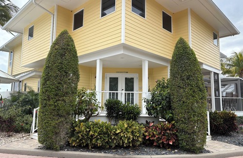 Port Saint Lucie House | Lush Waterfront Pool Home and Pool house with Pickleball court and Boat dock
