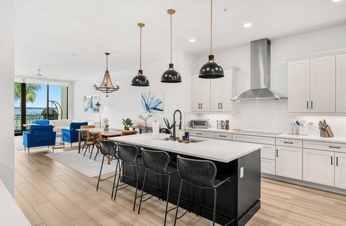 Melbourne Beach Condo | Melbourne Riverfront condo by the beach, pool, hot tub, dock, washer/dryer