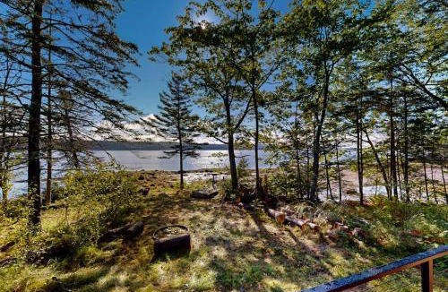 Sandy Point House | Modern Maine cottage with river views, deck, and a convenient washer/dryer