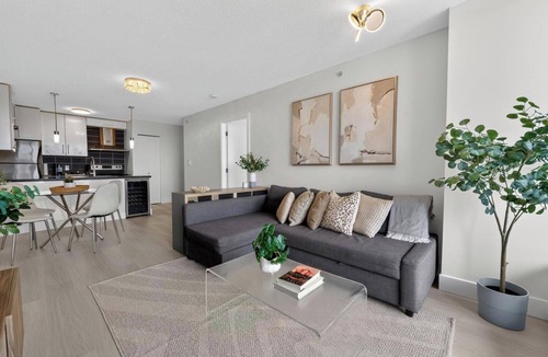 Gastown Condo | Modern & Spacious 2BR + Den Near BC Place Parking Pool