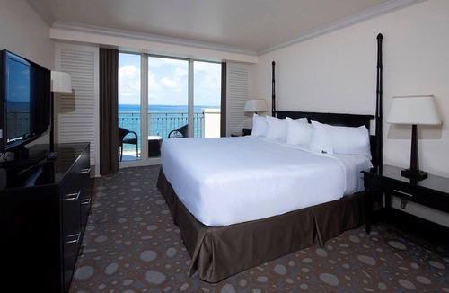 Central Beach Resort | Oceanfront Suite w/ Free WiFi, Kitchenette, & Furnished Private Balcony