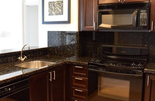Central Beach Resort | Oceanfront Suite w/ Free WiFi, Kitchenette, & Furnished Private Balcony
