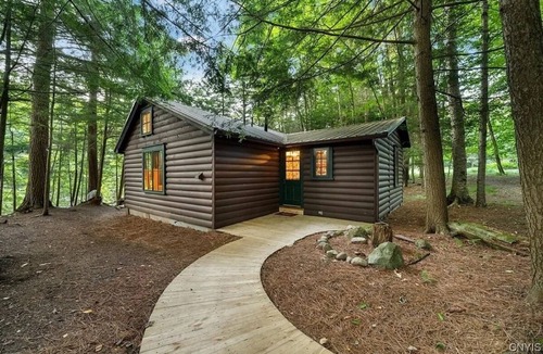 Town of Webb Cabin | Old Forge, NY - Secluded Riverfront Cottage with AC, W/D, Walk to Town!