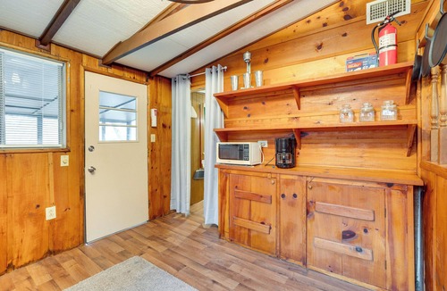 Warne Cottage | Peaceful Warne Cabin: Fenced Yard & Screened Porch
