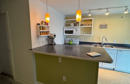 Cocoa Beach Villa | Penguins on the Beach | 2BR Steps to Beach & Downtown w/pool | Unit 3