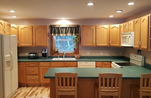 Raymond House | Pet-friendly home on peaceful Raymond Pond with beautiful sunrise views!