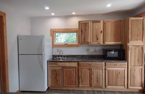 Caribou House | Prime location for snowsledders! Caribou, Maine - The Cottage