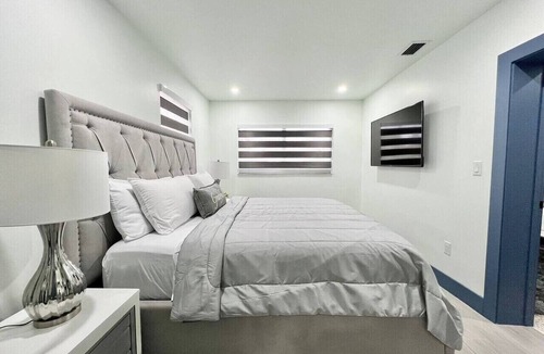Ludlam House | Private 4-bedroom interior + resort-style shared outdoor amenities