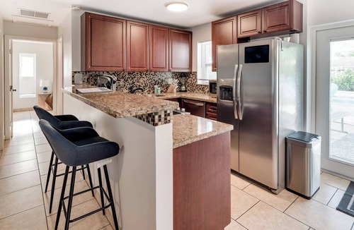 Hunt Club House | Relax & Recharge: Saltwater Pool + Lush Backyard Oasis in Palm Beach Gardens