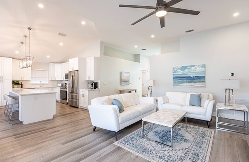 North Palm Beach Heights House | “Renovated 3BR Pool Home | Screened & Heated Pool | 3 King Beds”