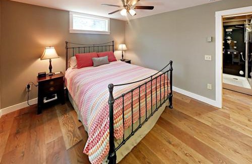 Lamoine Beach House | Renovated waterfront cottage with expansive deck, multiple fireplaces, & grill