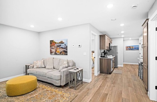 Riverside Apartment | RiverWest Trails End Chalet -Hot Tub - River View - Dog Friendly