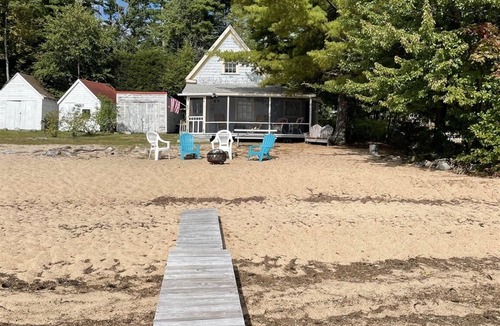 North Sebago Cottage | RUSTIC LAKESIDE COTTAGE. LARGE SANDY BEACH