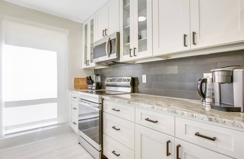 Hunt Club Condo | Serene Water-View Retreat with Wraparound Lanai & Elegant Renovations