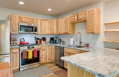University Area Apartment | Shared Yard + Fire Pit: Airy Anchorage Apt!