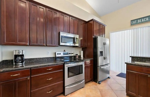 Singer Island House | Singer Island Beach Oasis: Heated Pool, Privacy Fence & Open Concept