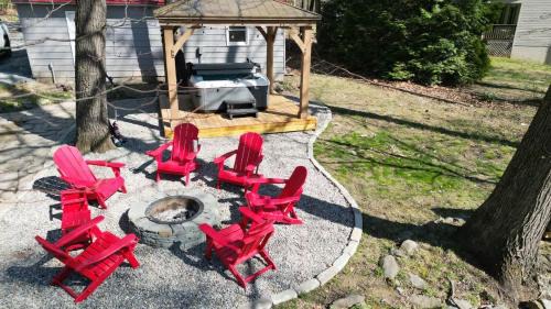 Millville House | Spacious cabin w private river, hot tub & fire pit