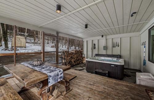 Berkeley Springs Ski Chalet | Sqyrls Nest - Hot Tub, Pet Friendly, Screen Porch, Grill, Wifi, Fire Pit, Deck, View, Family Friendly, Game Room, Shuffle Board, Wood Stove