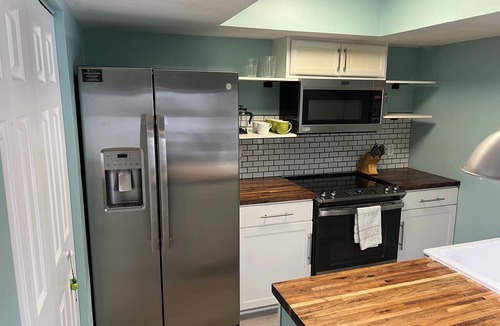 North Beach House | Stay five minutes from the beach in an updated, two-bedroom townhome!