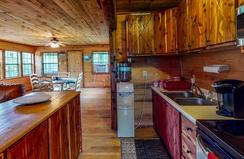 Stringtown Cabin | Stone cabin with a pond & water access - firepit, dog-friendly
