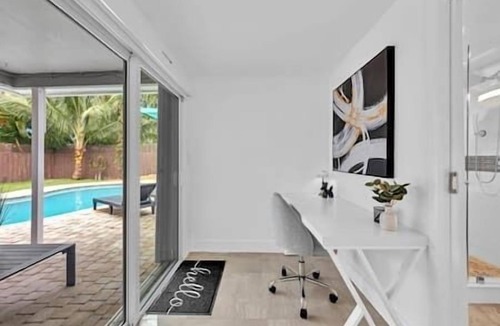 Middle River Terrace House | Sunny Days Getaway, 5BD Heated Pool Family Home!