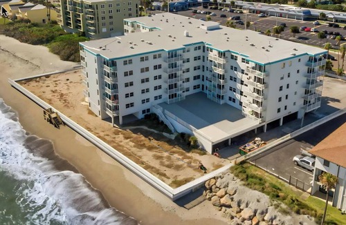 South Patrick Shores Condo | Sunny Satellite Beach 1BR Condo by the Sea W/Private Balcony & Partial Ocean View! ☀️