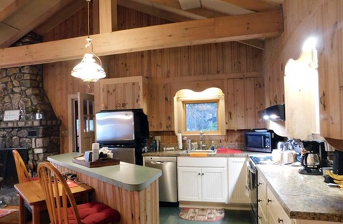 Naples Cottage | Sunset point waterfront home on with lots of outdoor space! Pet-friendly!