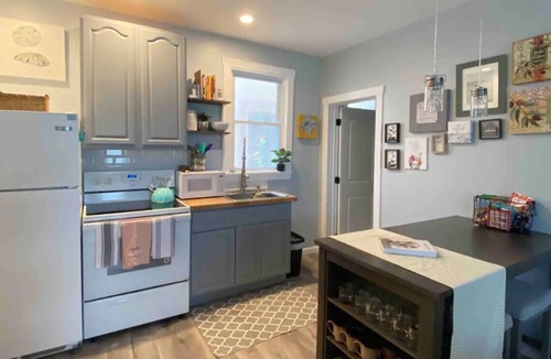 Catskill Apartment | The Hideaway a large studio that sleeps 4 with a fireplace and tub shower