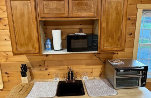 Hedgesville Cabin | The Saloon, cabin retreat.