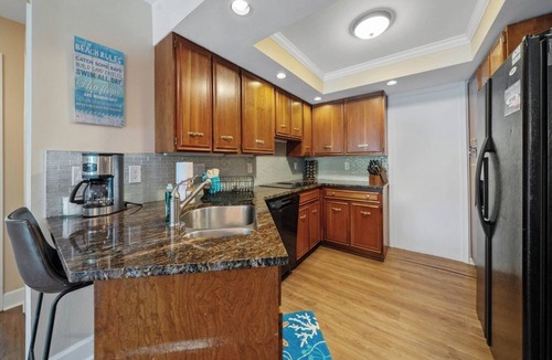 Seabreeze House | WALK to Beach, Town of Dewey w/LARGE Heated POOL thru Oct, HOT TUB and fire pit!