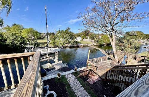 Pleasure Isles House | Waterfront Gulf Access Home - Private Dock + 6 Kayaks + Sunset Views - Sleeps 6