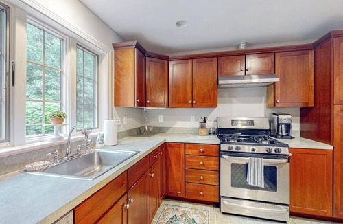 Raymond House | Waterfront home with a fireplace, grill, deck, washer/dryer, & AC - dog-friendly