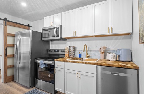 Rockaway Beach House | Wildflower Cottages:3 Rentals, Hot Tub& lake views