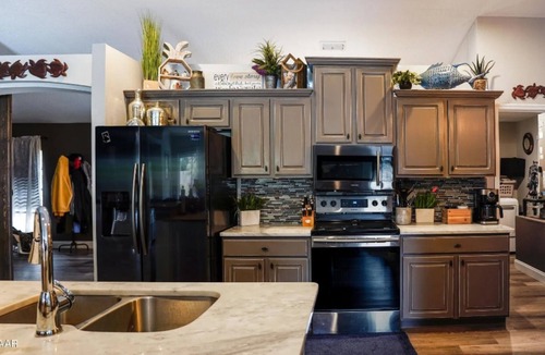 Florida Shores House | WINTER/SPRING DEALS POOL, TROPICAL F. BK YARD GARAGE BEACH CLOSE 2 ALL