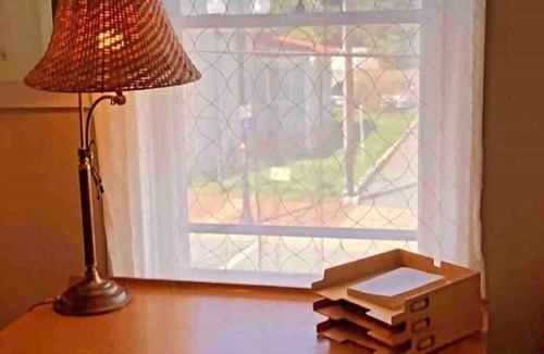 Winchester Apartment | WonderClock House downtown vintage duplex w/porches, steps to Handley Library