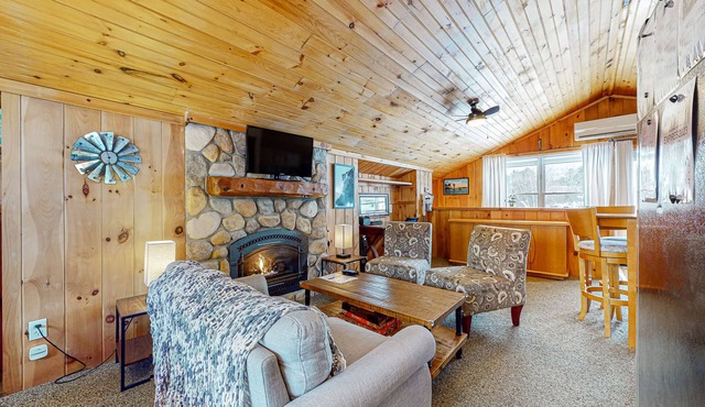 Adorable cottage with a full kitchen, gas fireplace, pool, koi pond, & gazebo