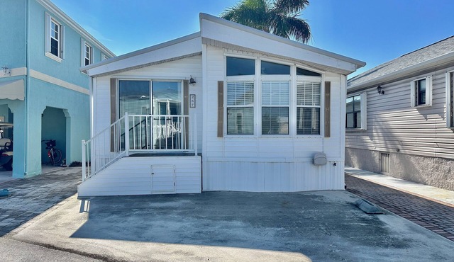 Beach Access home features an open floor plan with 2 bedrooms in a resort community