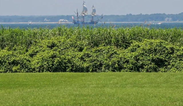 Buzzards Bay farmhouse with field and beach